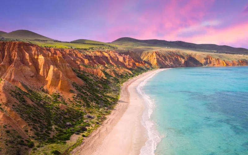 Sunset over Sellicks Beach, South Australia with dramatic sky and calm ocean